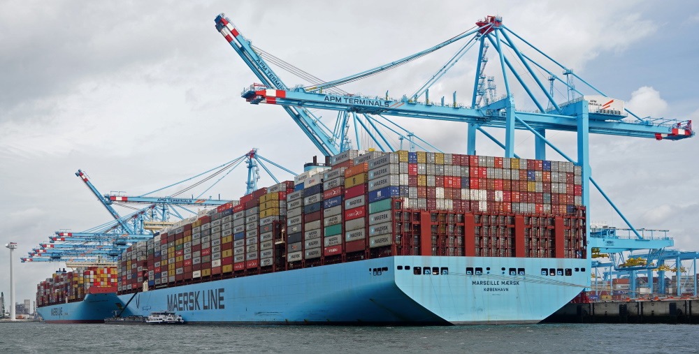 Container Shipping: Large specially constructed container ships can carry as many as 18,000 containers.